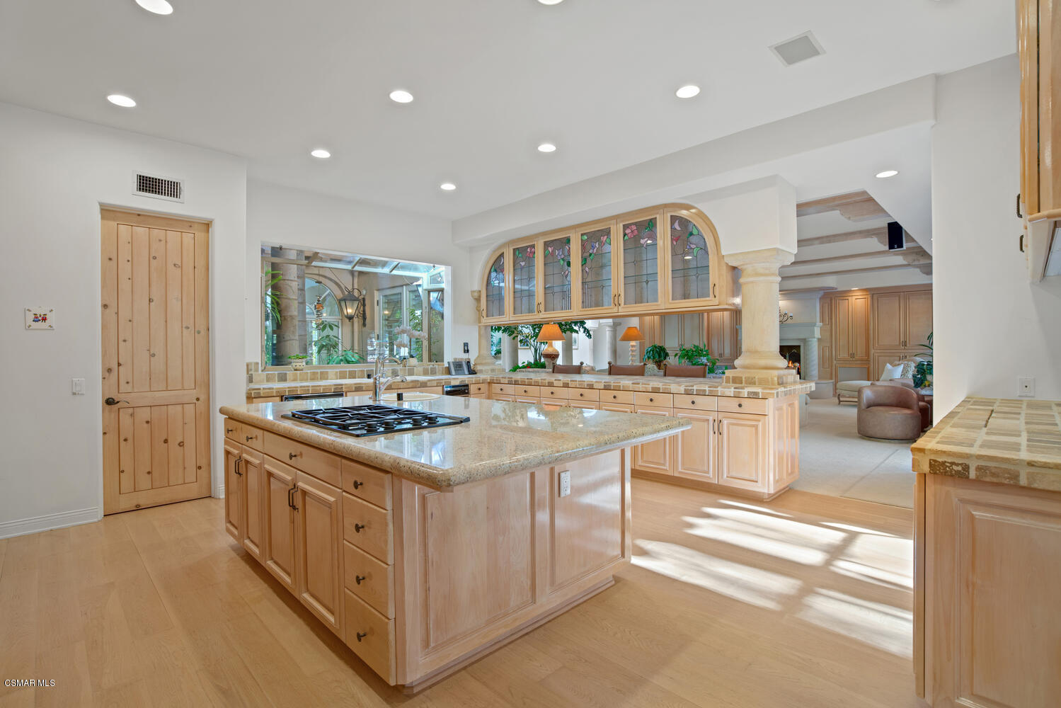 6021 John Muir Road Hidden Hills, CA 91302 - Photo 30 of 74 a kitchen with stainless steel appliances granite countertop a stove and a refrigerator