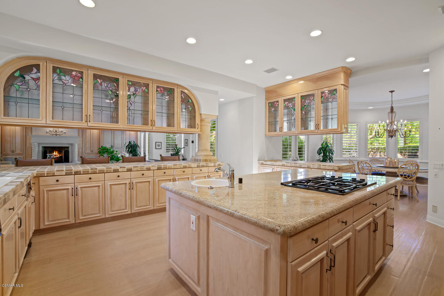 6021 John Muir Road Hidden Hills, CA 91302 - Photo 31 of 74 a kitchen with stainless steel appliances granite countertop a stove and a sink