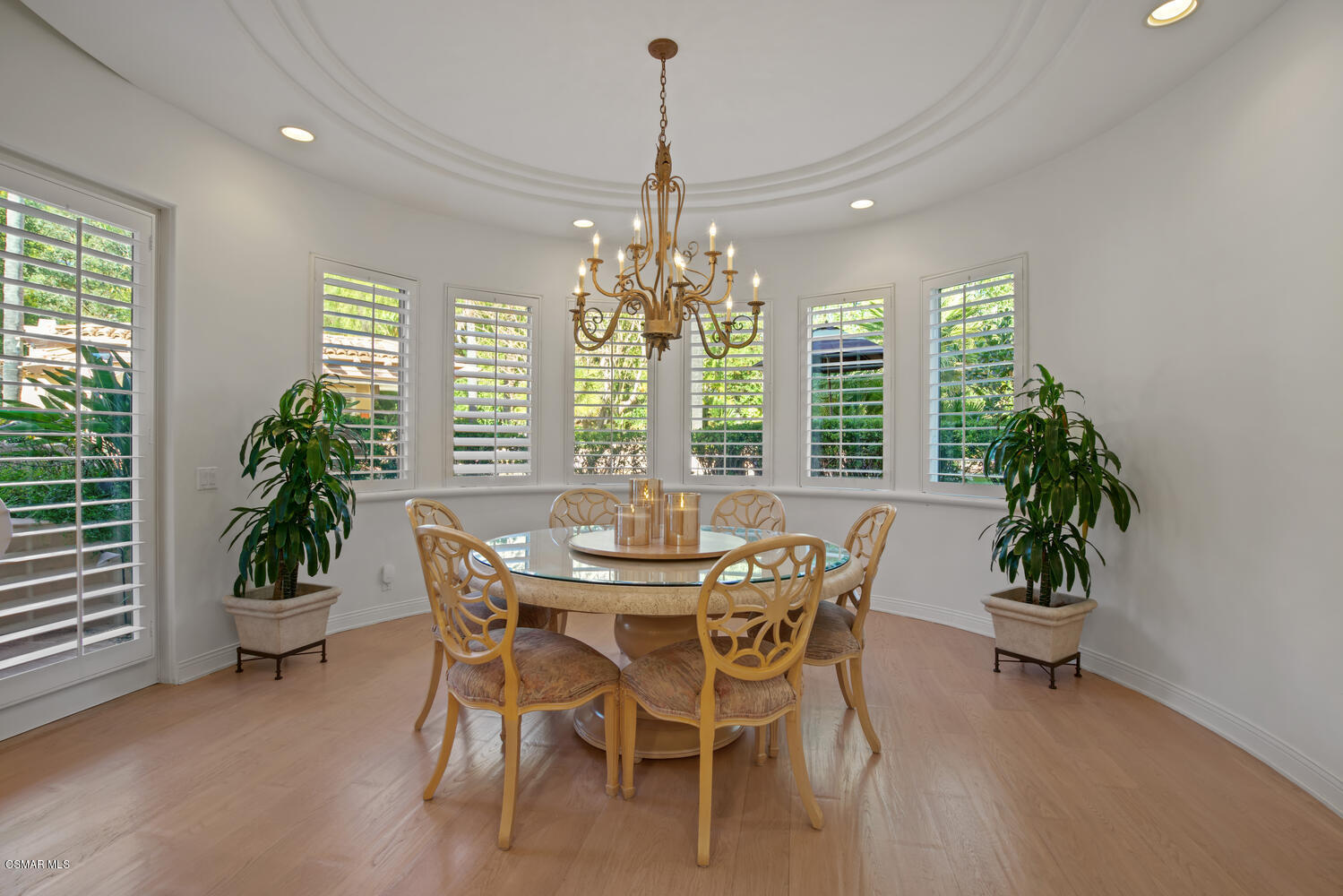 6021 John Muir Road Hidden Hills, CA 91302 - Photo 32 of 74 a dining room with furniture window and wooden floor