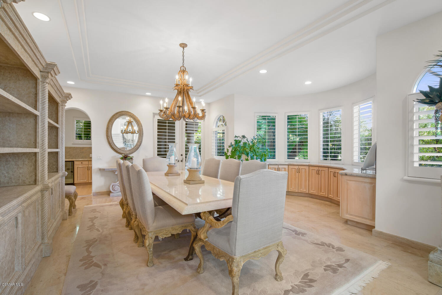6021 John Muir Road Hidden Hills, CA 91302 - Photo 33 of 74 a view of a dining room with furniture window and wooden floor