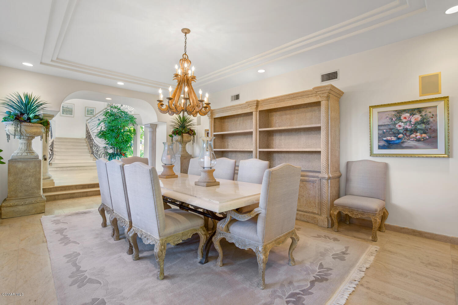 6021 John Muir Road Hidden Hills, CA 91302 - Photo 34 of 74 a view of a dining room with furniture and a chandelier