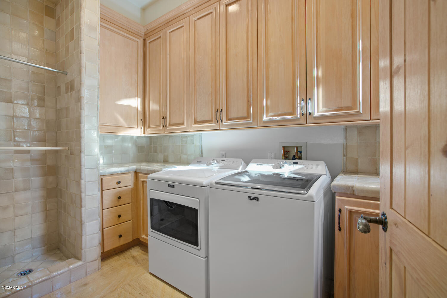 6021 John Muir Road Hidden Hills, CA 91302 - Photo 43 of 74 a utility room with dryer and washer