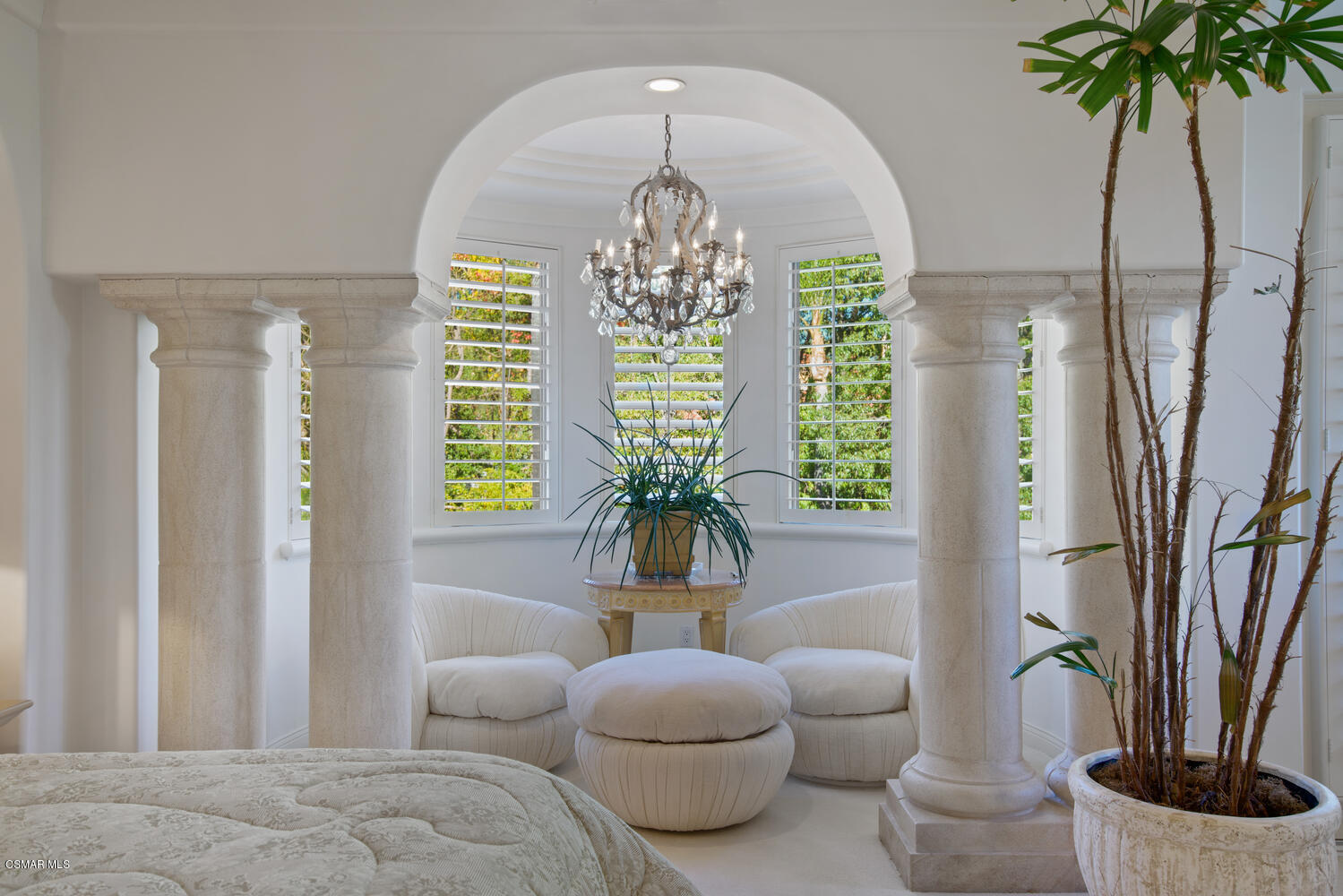 6021 John Muir Road Hidden Hills, CA 91302 - Photo 49 of 74 a living room with furniture and a chandelier