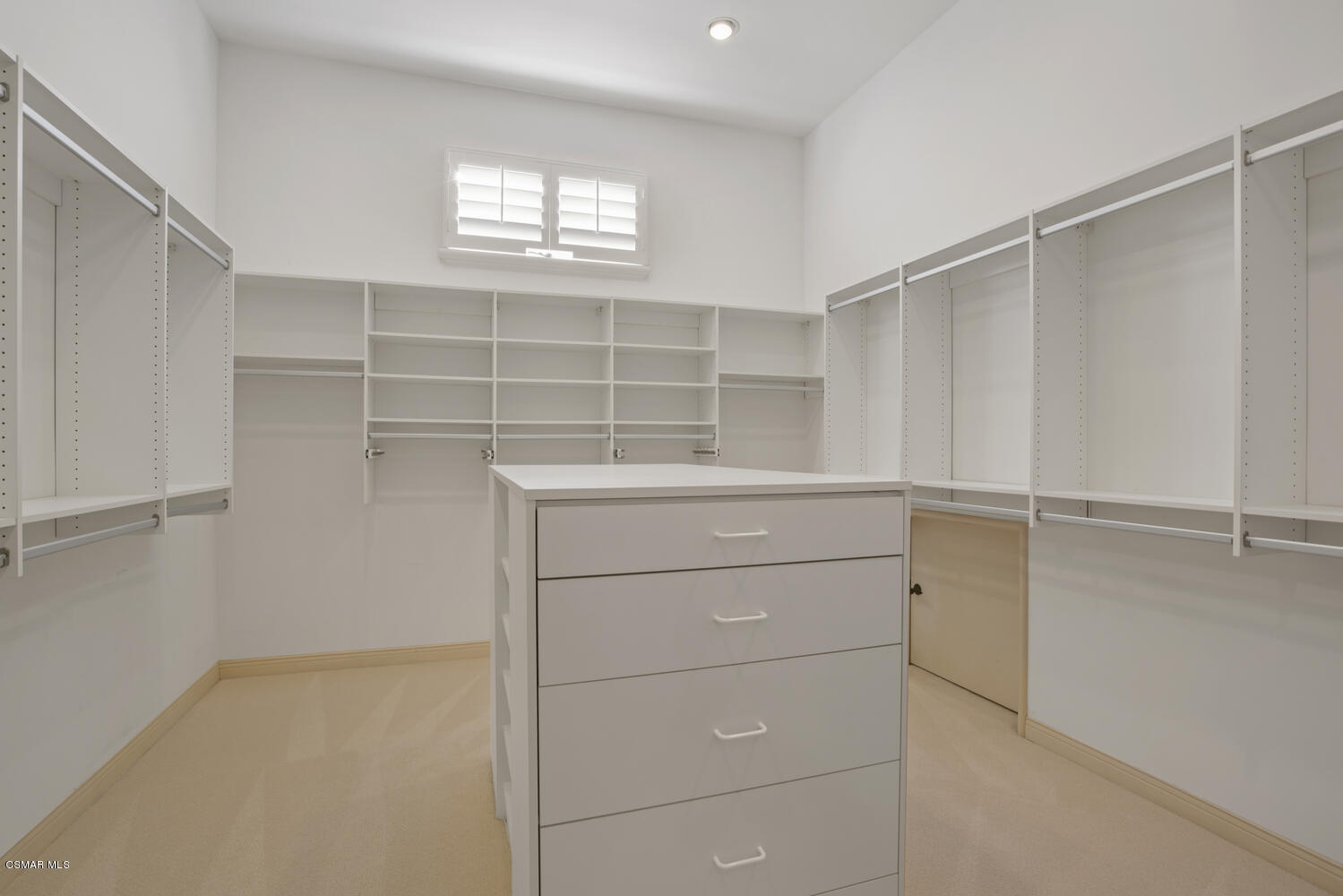 6021 John Muir Road Hidden Hills, CA 91302 - Photo 57 of 74 a view of a closet in a room