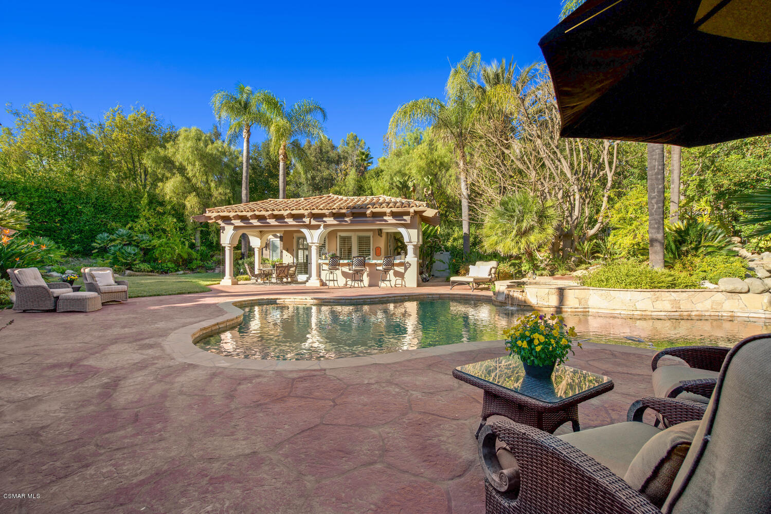 6021 John Muir Road Hidden Hills, CA 91302 - Photo 59 of 74 a view of a chairs and table in the patio