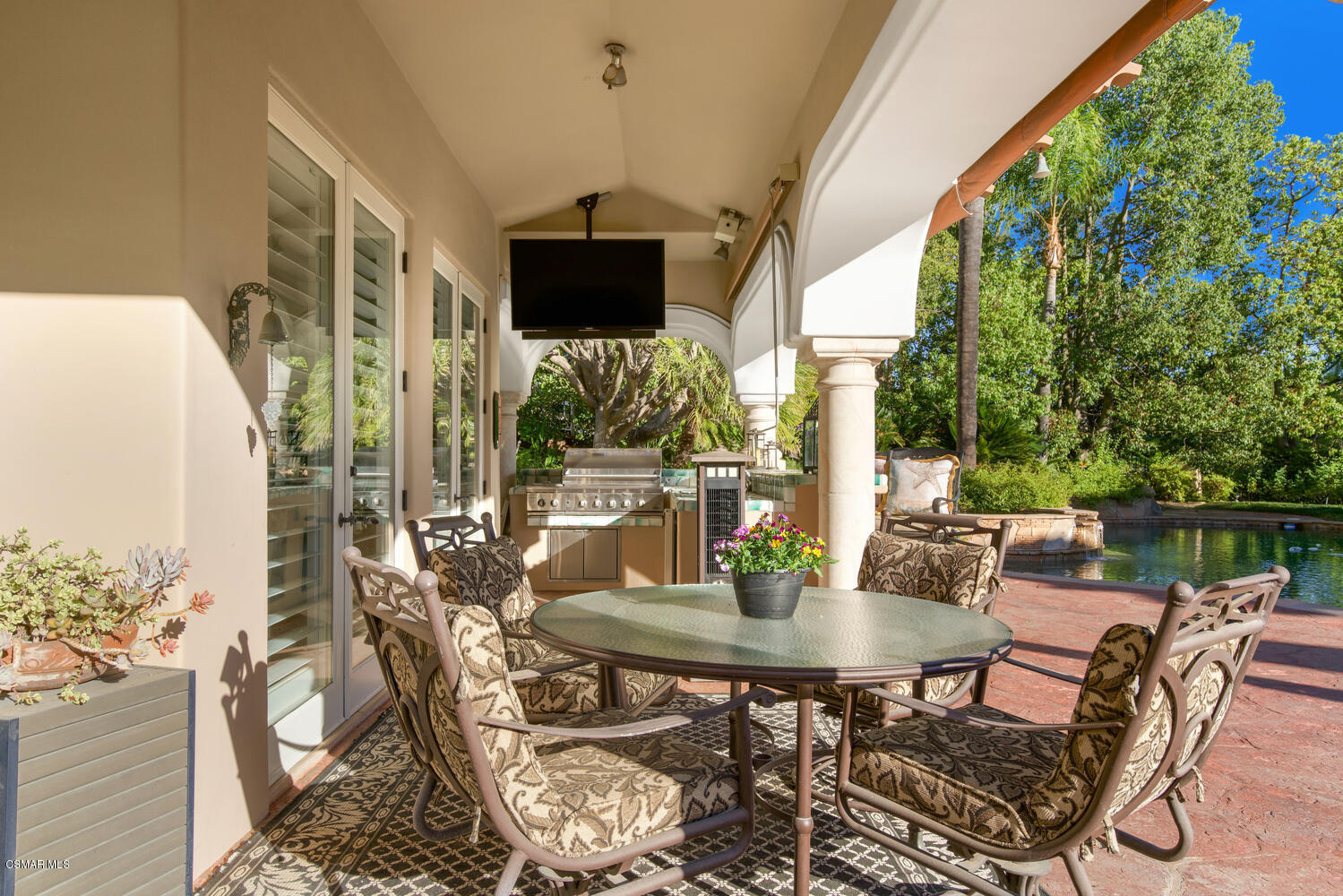 6021 John Muir Road Hidden Hills, CA 91302 - Photo 60 of 74 a view of a dining room with furniture window and outside view
