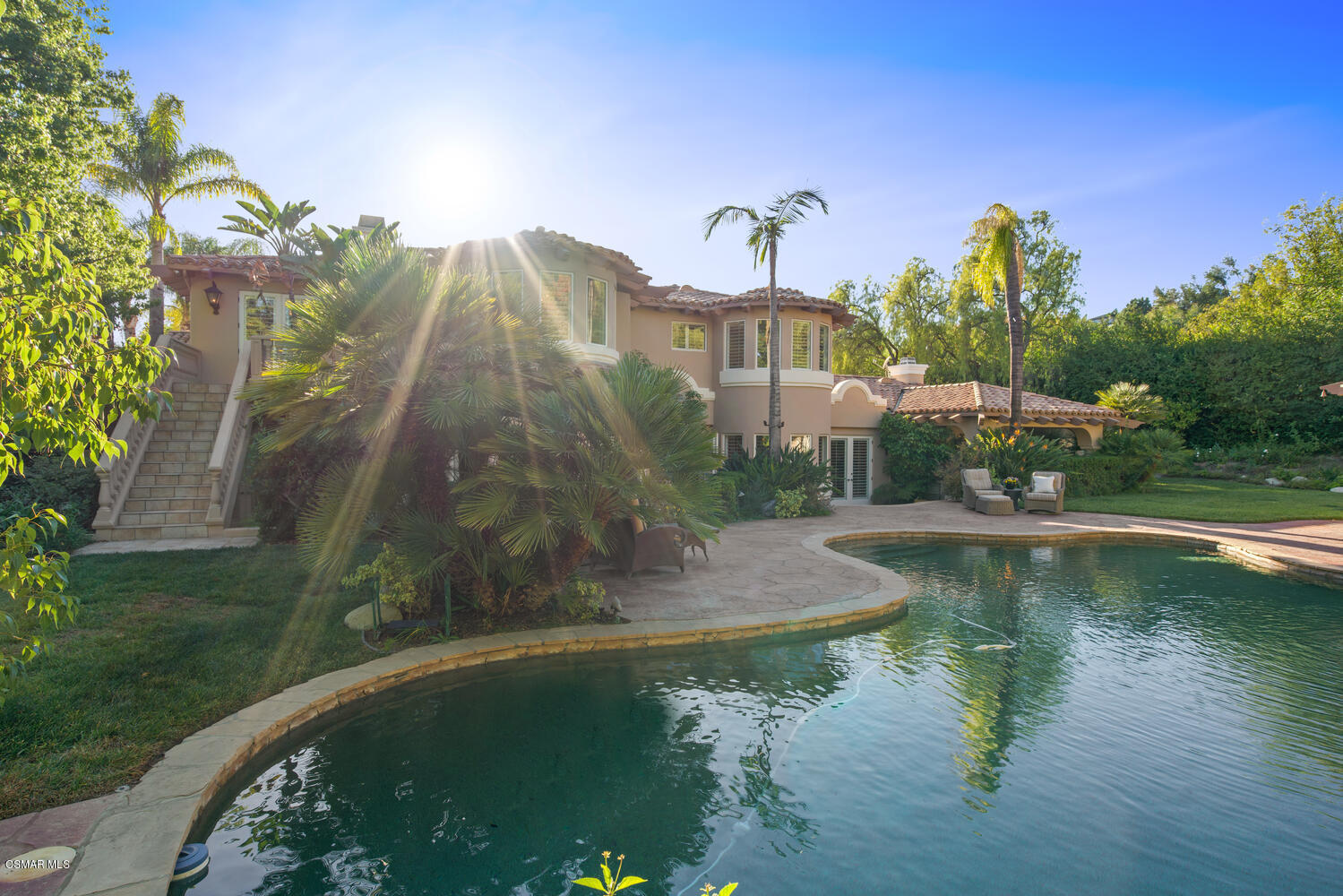 6021 John Muir Road Hidden Hills, CA 91302 - Photo 65 of 74 a view of a lake with a yard