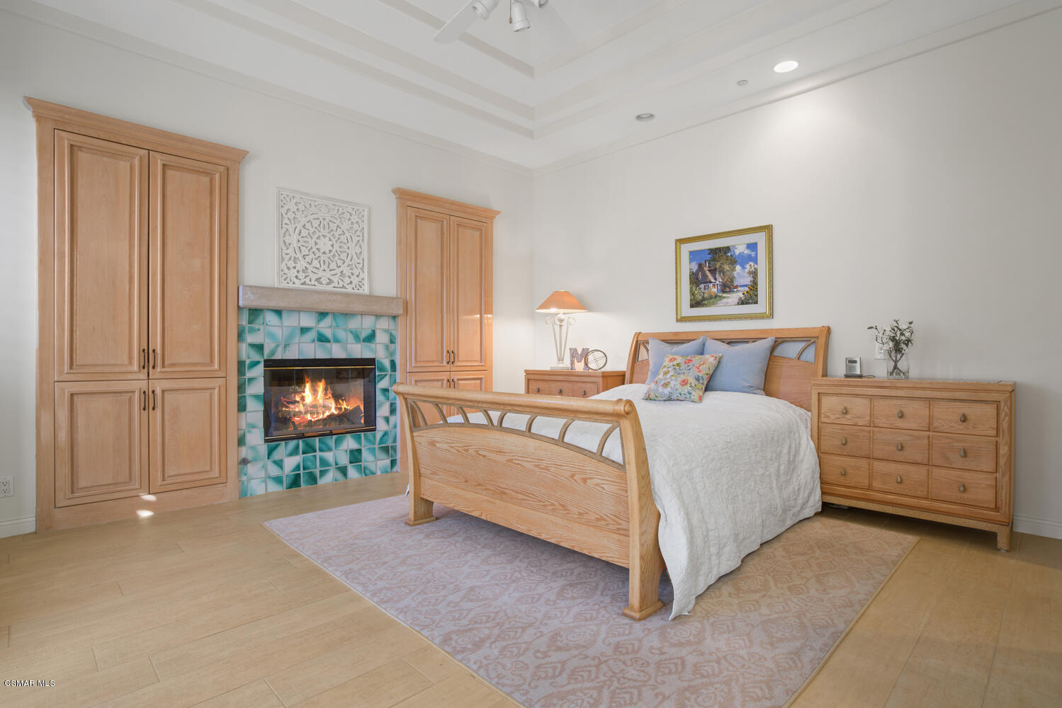 6021 John Muir Road Hidden Hills, CA 91302 - Photo 69 of 74 a bed room with a bed and a fireplace