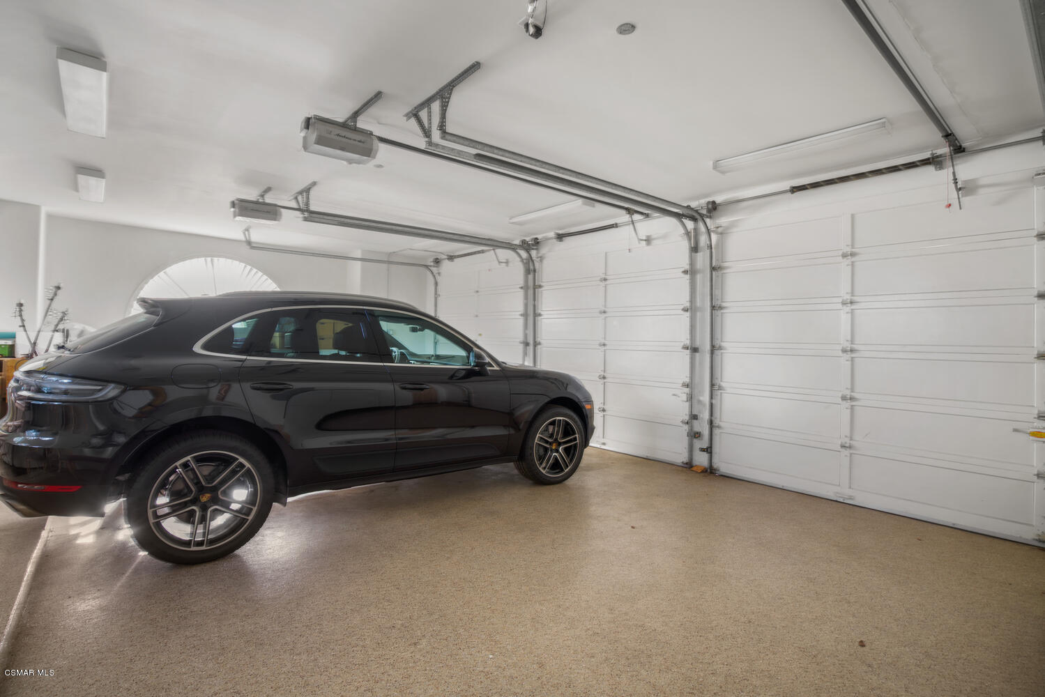 6021 John Muir Road Hidden Hills, CA 91302 - Photo 71 of 74 a view of a car that is parked in a garage