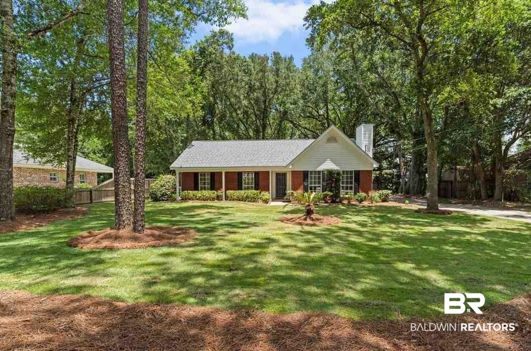 10251 Windmill Road Fairhope, AL 36532 - Photo 5 of 44 View of front facade featuring a chimney
