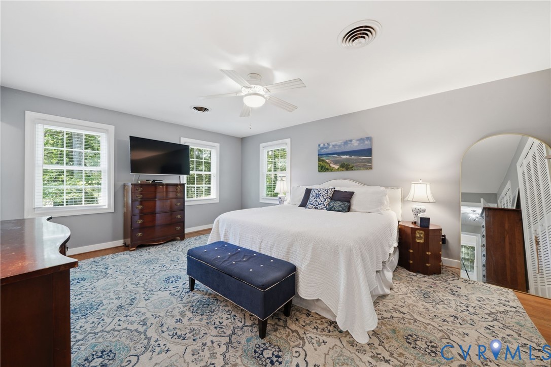 2101 Castlebridge Road Midlothian, VA 23113 - Photo 20 of 37 a bed room with a bed a television and dresser