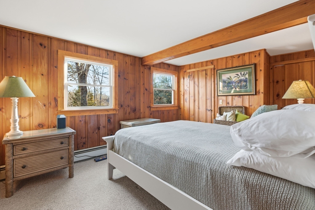 3 W Road Sandwich, MA 02644 - Photo 11 of 15 a bedroom with a bed and a window