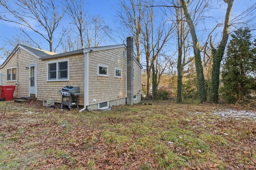 3 W Road Sandwich, MA 02644 - Photo 14 of 15 a view of a house with a yard