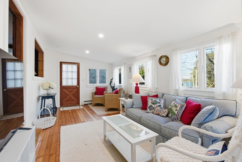 3 W Road Sandwich, MA 02644 - Photo 3 of 15 a living room with furniture and a large window