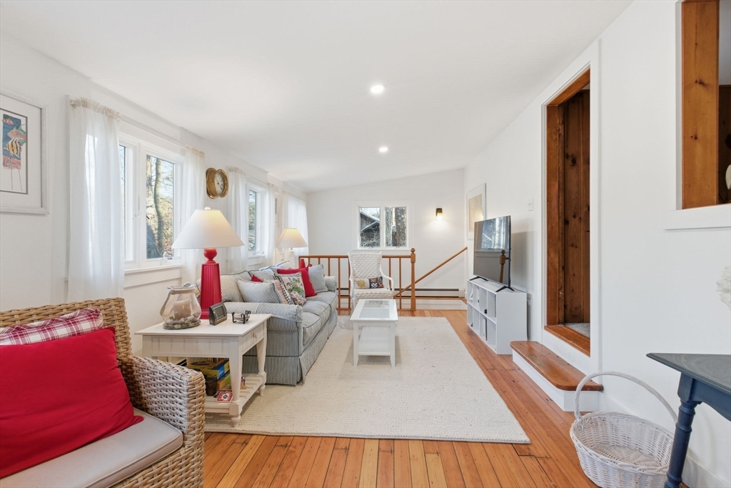3 W Road Sandwich, MA 02644 - Photo 4 of 15 a living room with furniture and a wooden floor