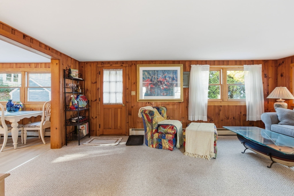 3 W Road Sandwich, MA 02644 - Photo 6 of 15 a living room with furniture and large windows