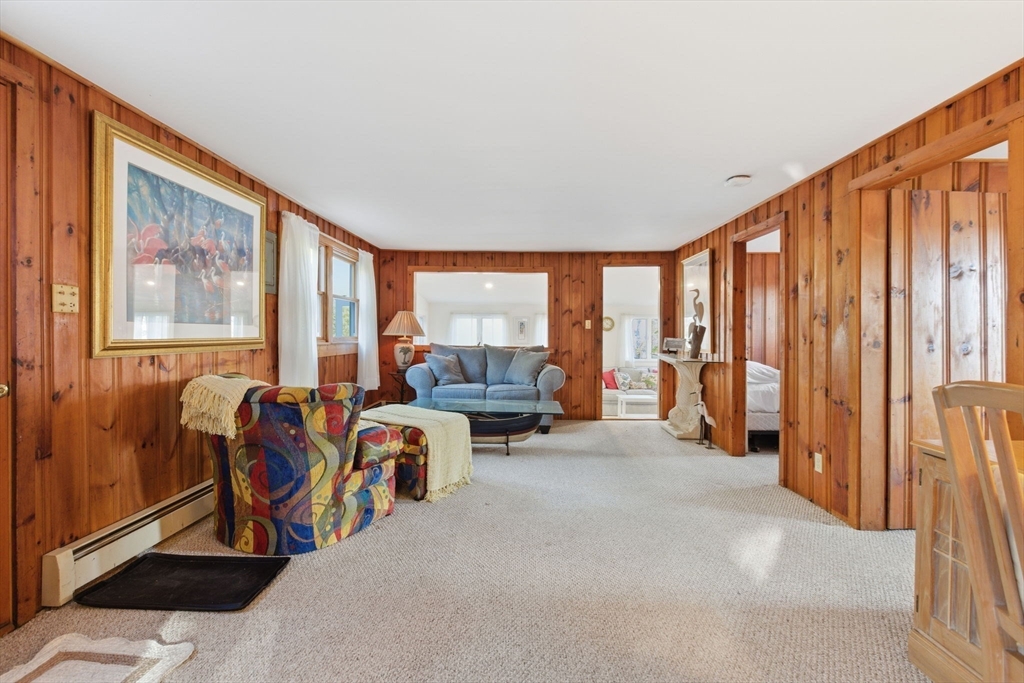 3 W Road Sandwich, MA 02644 - Photo 7 of 15 a living room with furniture and large windows