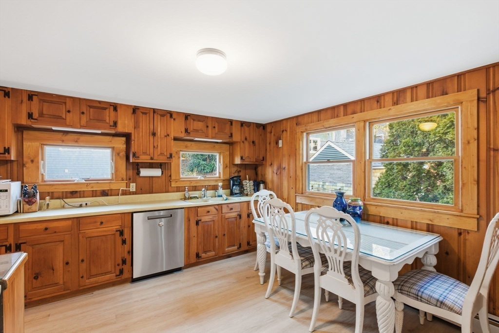 3 W Road Sandwich, MA 02644 - Photo 9 of 15 a dining room with a sink table and chairs