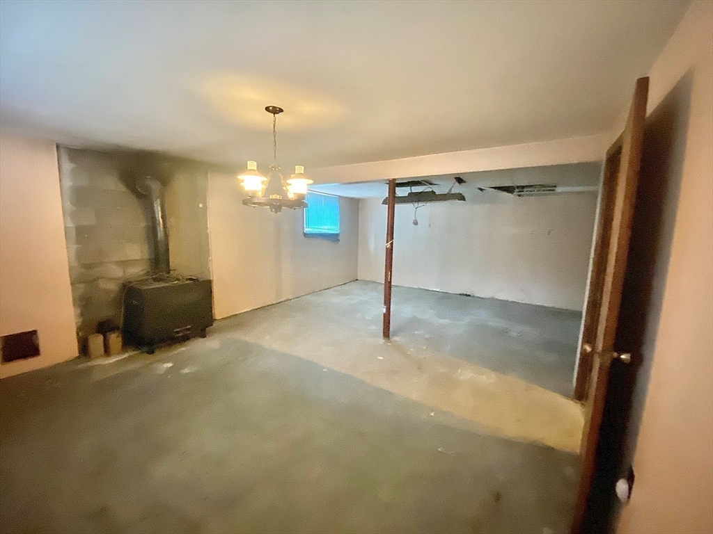 15 Cooper Road Northbridge, MA 01534 - Photo 13 of 22 a view of a room with a garage