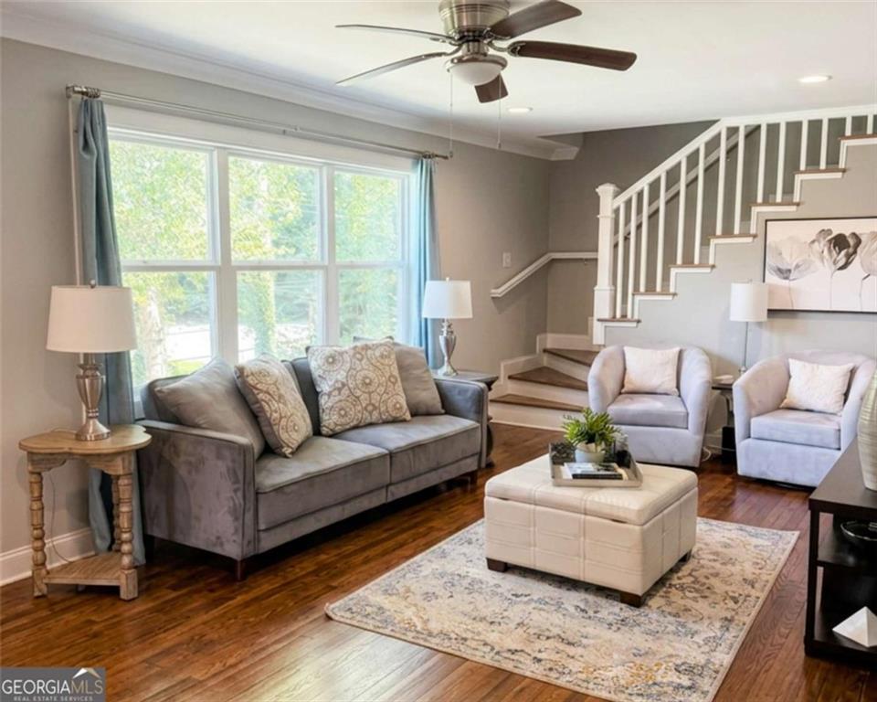 2561 Sylvan Road East Point, GA 30344 - Photo 2 of 4 a living room with furniture and a large window