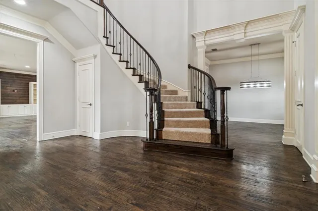 a view of entryway with wooden floor