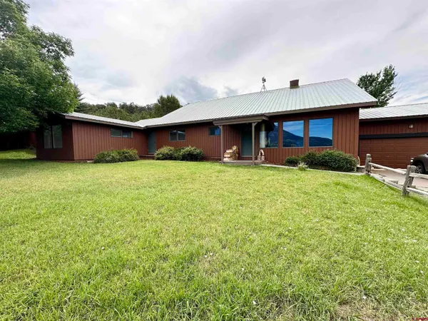 a house view with a garden space