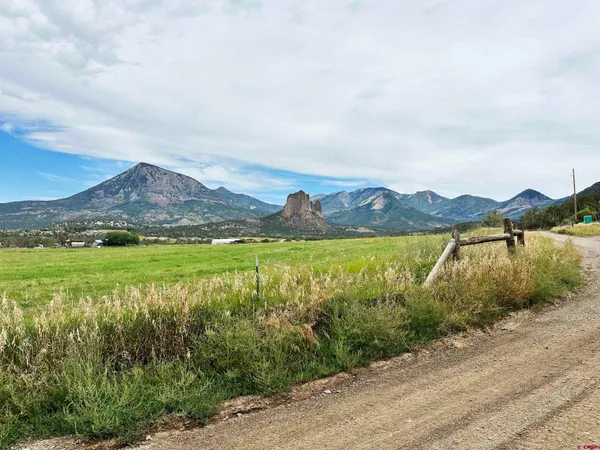 a view of a lake with a mountain in the background