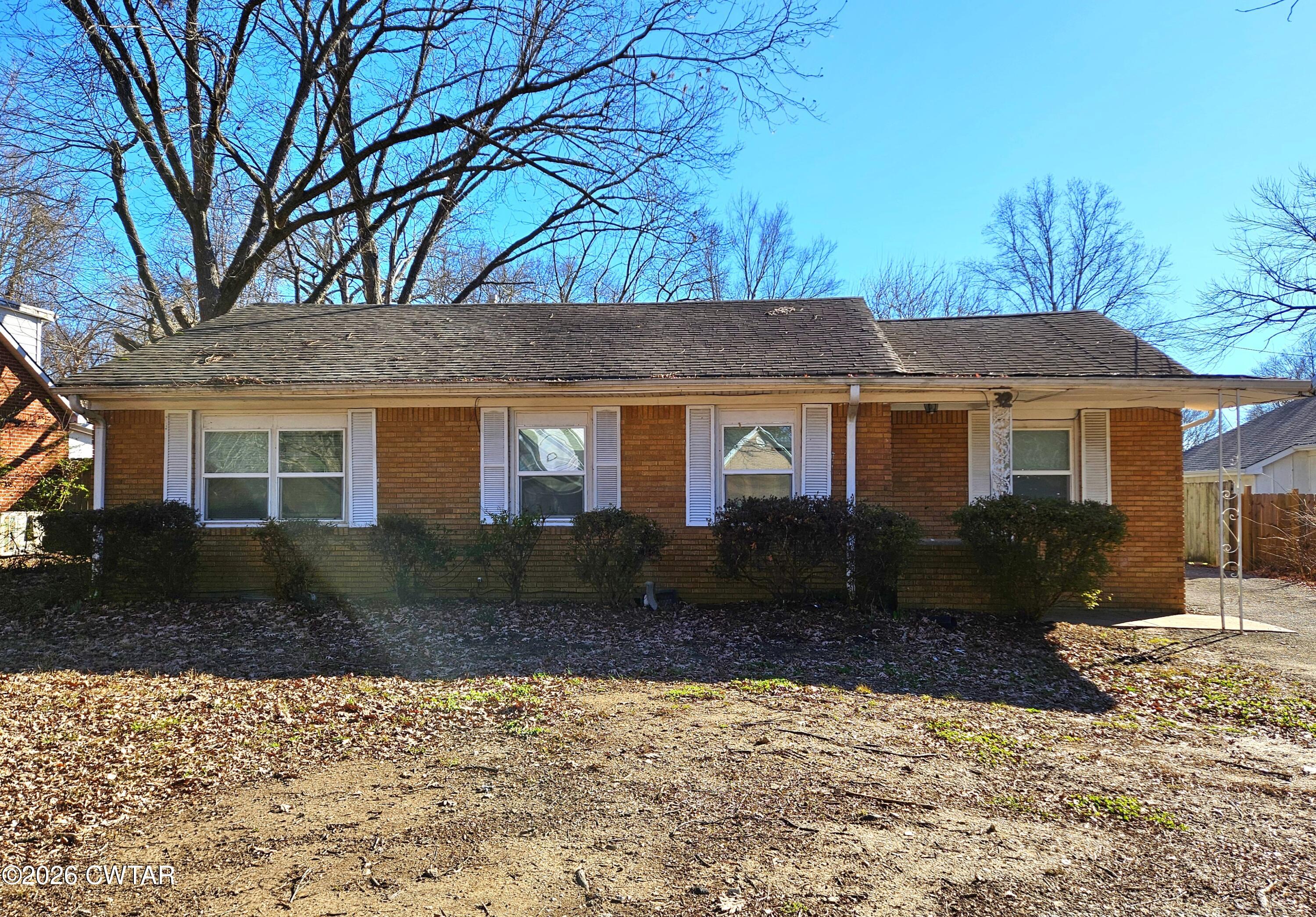 32 Russell Road Jackson, TN 38301 - Photo 15 of 15 a front view of a house with a yard