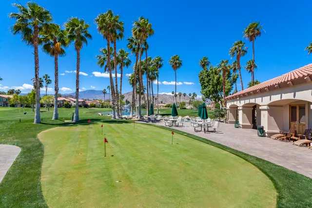 a view of a golf course with a yard