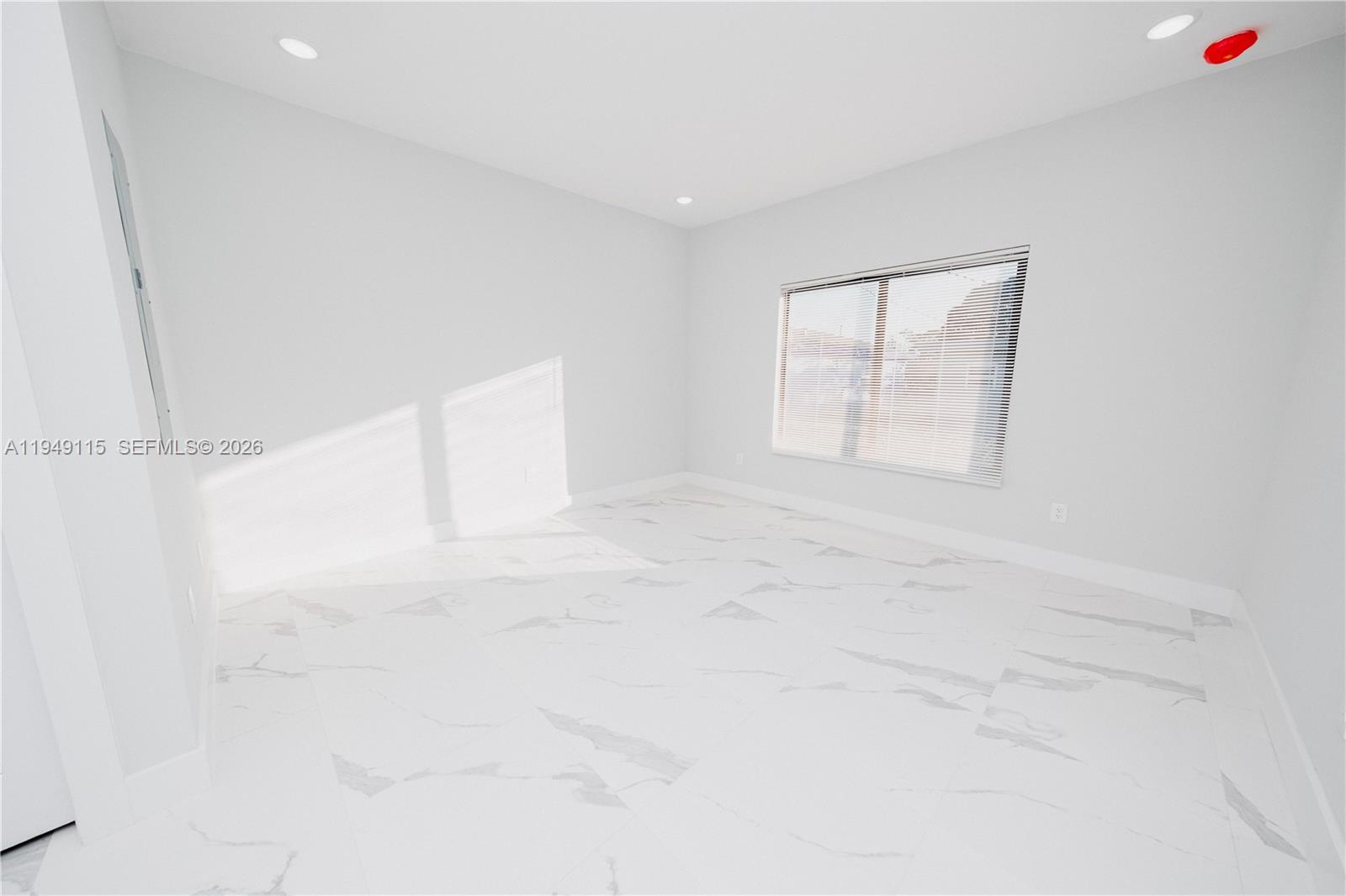 820 Northwest 18th Avenue Pompano Beach, FL 33069 - Photo 19 of 46 a view of empty room