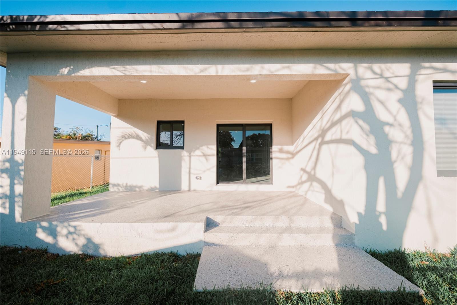 820 Northwest 18th Avenue Pompano Beach, FL 33069 - Photo 36 of 46 a view of front door