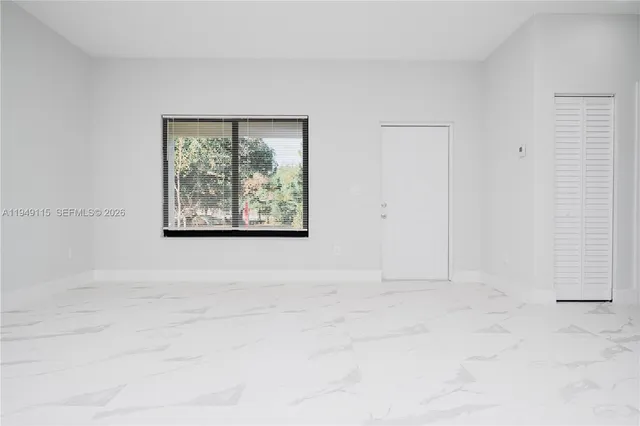 a kitchen with stainless steel appliances granite countertop a stove top oven a sink and dishwasher