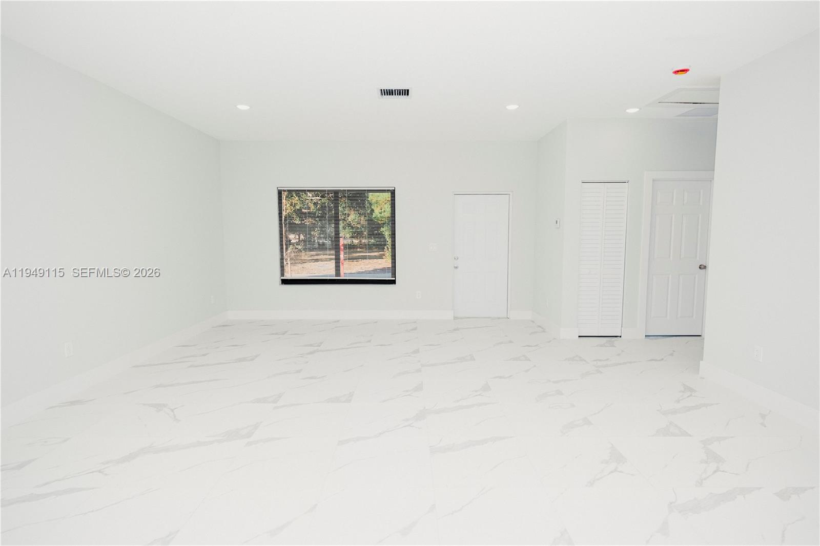 820 Northwest 18th Avenue Pompano Beach, FL 33069 - Photo 6 of 46 a view of an empty room