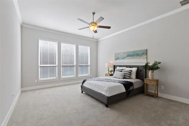 a bathroom with a toilet a sink and a mirror