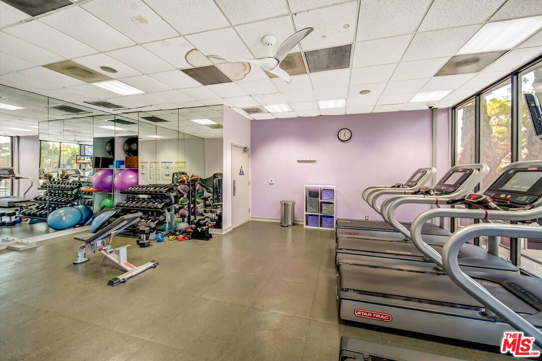 2160 Century Park, Unit 1503 Los Angeles, CA 90067 - Photo 18 of 22 a view of a room with gym equipment