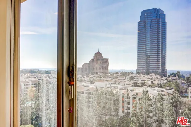 a view of balcony with furniture