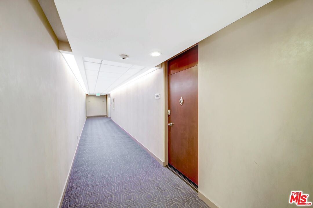 2160 Century Park, Unit 1503 Los Angeles, CA 90067 - Photo 4 of 22 a view of a hallway with wooden floor