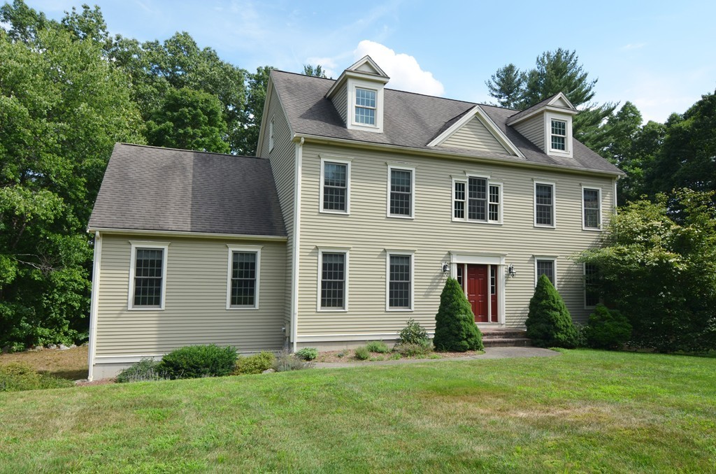 30 Mill Road Harvard, MA 01451 - Photo 3 of 21 a front view of a house with a yard