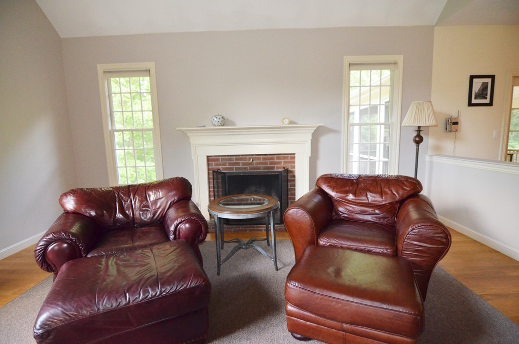 30 Mill Road Harvard, MA 01451 - Photo 9 of 21 a living room with furniture fireplace and window