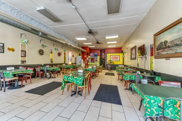 a view of a dining room with furniture