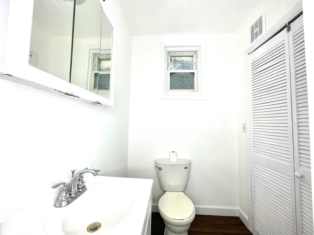 a bathroom with a sink and a toilet