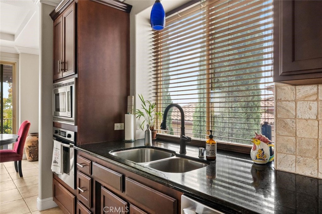 3290 Summit Ridge Terrace Chico, CA 95928 - Photo 17 of 60 The kitchen has a built in microwave and oven