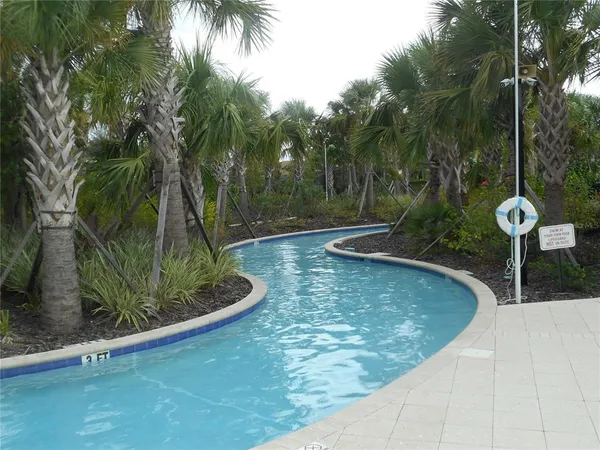 a view of a park with swings and slides