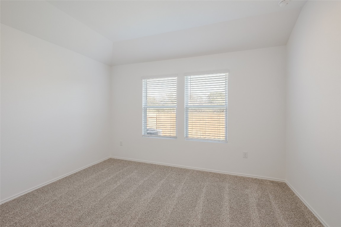 12202 Pike Bend Mustang Ridge, TX 78610 - Photo 14 of 24 an empty room with a window