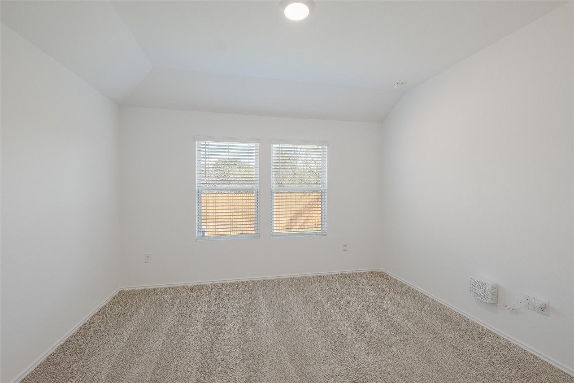 12202 Pike Bend Mustang Ridge, TX 78610 - Photo 16 of 24 an empty room with a window