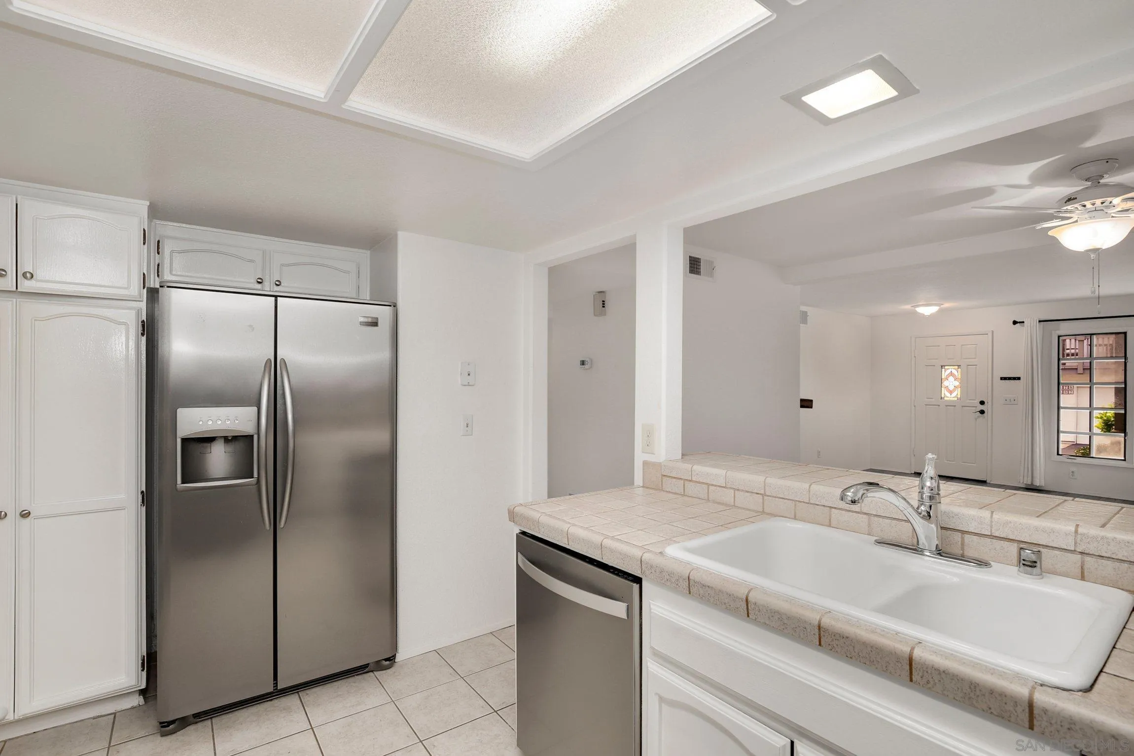 381 Playa Blanca Encinitas, CA 92024 - Photo 12 of 41 a bathroom with a sink and a mirror