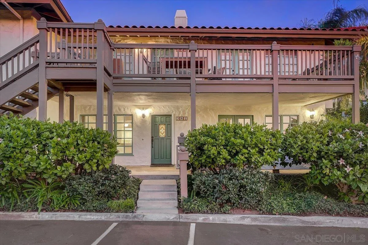 381 Playa Blanca Encinitas, CA 92024 - Photo 4 of 41 a view of a building with a garden