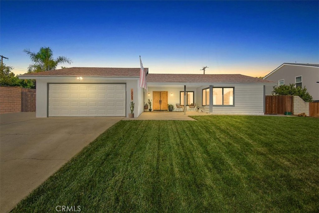 6065 Keswick Avenue Riverside, CA 92506 - Photo 1 of 1 a front view of a house with a yard