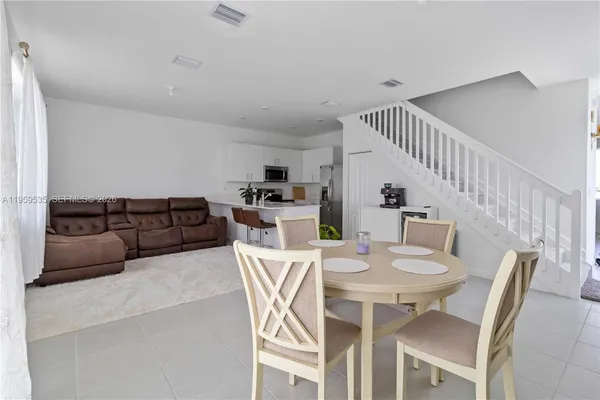 a view of a dining room with furniture