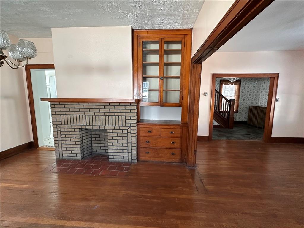 26 South Main Street Houston, PA 15342 - Photo 12 of 44 wooden floor in an empty room and a window